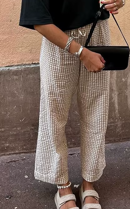 A woman in wide-leg pants image